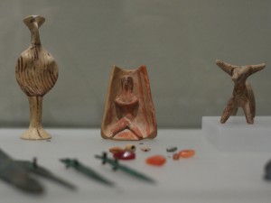 Clay figurines; enthroned male, "Phi" type female, animal. Late Bronze Age (Mycenaean period) 15th-12th century BC.